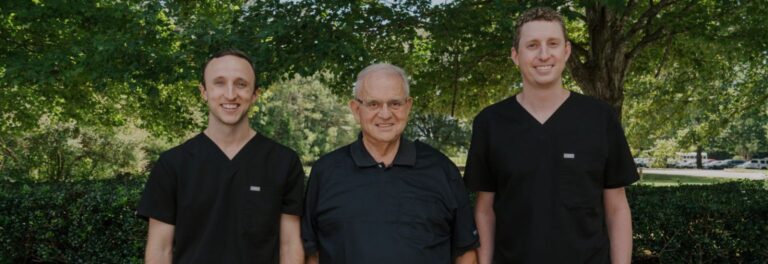 Dr. Brant Sandifer Dr. Lawrence George and Dr. Drew Richardson in uniform 1536x528 Dentist Watkinsville GA 2 768x264
