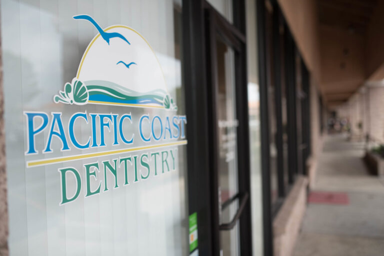 Signage on glass pane at Pacific Coast Dentistry Paso Robles 768x513